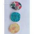 Clothing buttons made of resin fragments